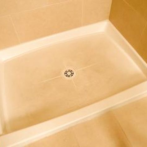 Remove brown stains from shower floors to keep them attractive. Fiberglass Shower Pan, Shower Basin, Fiberglass Shower, Bathtub Drain, Inspired Interiors, Shower Base, Shower Pan, Trendy Bathroom, How To Remove Rust