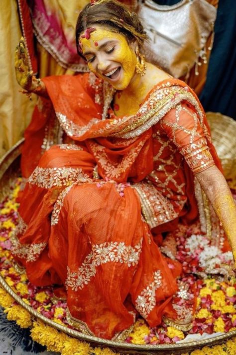 haldi outfit for brides Ankita Lokhande Haldi Ceremony, Latest Haldi Outfits For Bride, Haldi Suit Design For Bride, Yellow Sharara For Haldi For Bride, Colorful Haldi Outfit For Bride, Celebrity Haldi Look, Orange Outfits For Haldi, Haldi Saree Indian Bridal Yellow, Orange Dress For Haldi