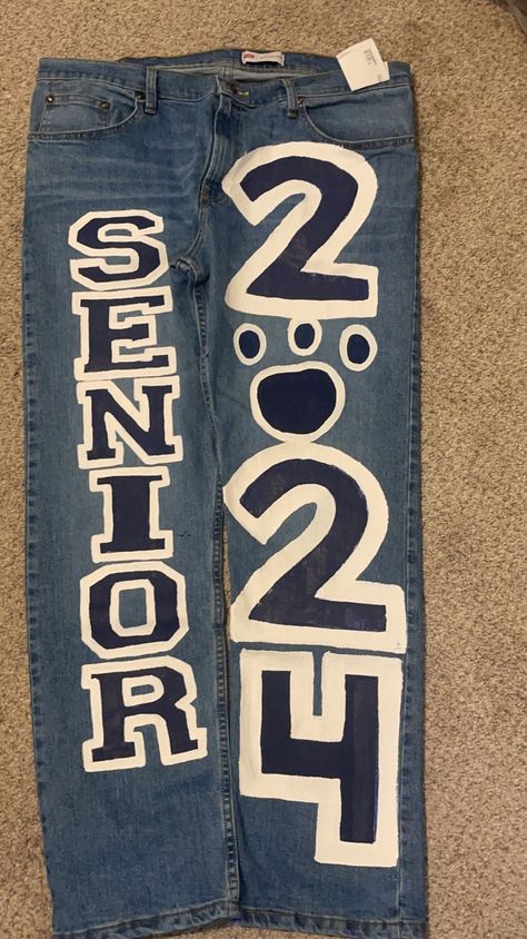 Senior Jeans Patchwork, Senior Jeans Blue And Gold, Blue And Yellow Senior Jeans, Senior 2025 Jeans, Spirt Jeans, Painted Jeans School Spirit Senior, Senior Pants High Schools, Senior Jeans Ideas, Decorating Jeans