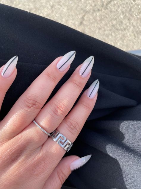 minimalistic long nails inspo with white base and black line #minimalist #nailsart #nailsoftheday #nailstagram Line Down The Middle Nails, Straight Line Nail Art, Linework Nails, Minimalistic Nails, Line Nail Designs, White Almond Nails, Black Almond Nails, Black White Nails, Line Nail Art