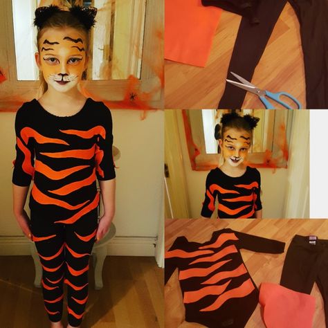 This is a tiger costume I created for an equestrian vaulting competition. I used a black leotard and black leggings, I used a hot glue gun to stick the orange felt stripes Diy Tiger Costume Women, Diy Tiger Costume Kids, Tiger Outfit Halloween, Tiger Costume Diy, Cute Tiger Costume, Girls Tiger Costume, Jungle Book Costumes, Vaulting Equestrian, Tiger Costume