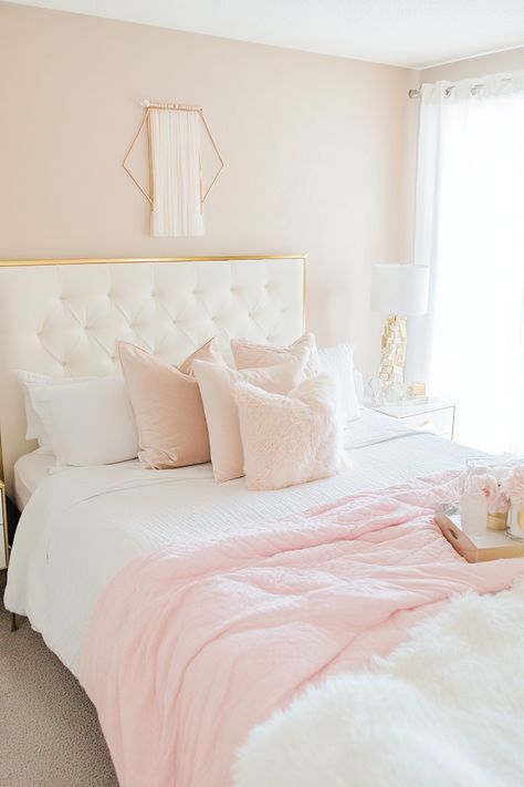 Discover the beauty of pink and gold bedroom ideas. Explore plush pink carpets, gold accent furniture, and elegant rose gold light fixtures. Discover pink velvet headboards and gold-framed mirrors for a touch of glamour.  Find inspiration for pink and gold throw pillows and delicate gold wall decals. Pink and gold bedrooms are perfect for a space that's both glamorous and inviting. Light Pink White And Gold Bedroom, Light Pink And Gold Bedroom, Gold And Pink Aesthetic, Pink And Gold Bedroom Ideas, Gold Bedroom Design, Gold Accents Bedroom, Blush Pink Walls, Pink Gold Bedroom, Gold Accent Furniture