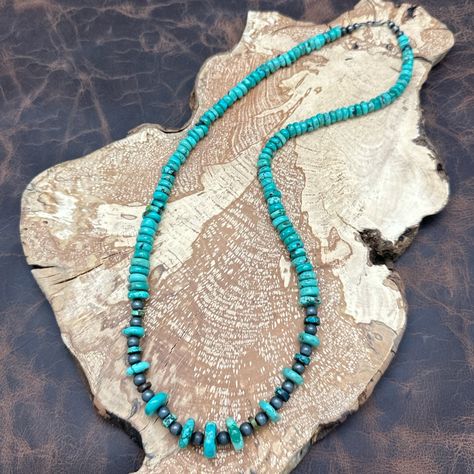 This Is A Beautiful Native-Made Beaded Necklace Showcasing Stunning Donut-Shaped Carico Lake Turquoise Beads In Dreamy Green, Ranging From 6.6mm To 14.4mm In Size. The Center Section Features 6mm Round Beaded Accents, Adding A Touch Of Elegance. The Design Is Completed With A Pair Of 5mm Sterling Silver Bench Beads On Each End. The Necklace Is Securely Strung On Durable Beading Wire And Closes With A Hook And Double Eye Closure, Making It Both Functional And Stylish. With A Total Length Of 24.75” And A Weight Of 58 Grams, This Necklace Is A Striking Piece Of Native American Craftsmanship. Product Details: Decade: 2020s (New And Never Worn) Total Length: 24.75” Total Wei Cherokee Jewelry, Stretch Beaded Bracelets Diy, Hubei Turquoise, Turquoise Beaded Necklace, Jewelry Board, Turquoise Bead Necklaces, Bracelets Diy, Bracelet Diy, Beaded Bracelets Diy