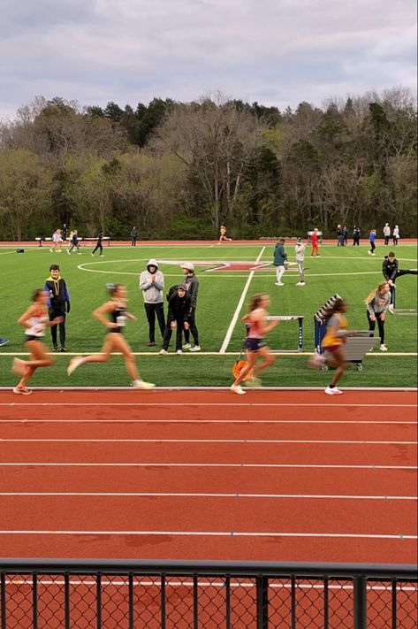 College runners in different uniforms racing on a track in this blurry photo Vision Board Track And Field, Kids Track And Field, Track Running Aesthetic, Track Season Aesthetic, Track Asethic, Running Asethic, Track Aesthetic Running, College Athlete Aesthetic, Track Runner Aesthetic