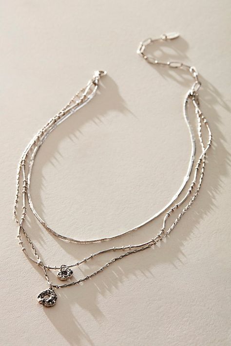 Add the perfect touch of effortless edge to absolutely every look with this so cool necklace featured in a layered, textured, chain silhouette with tiered pendant at bottom for dimension. | Effortless Layered Necklace by Free People in Silver Layering Sterling Silver Necklaces, Mixed Metal Necklace Stack, Silver Stacked Necklaces, Silver Necklaces Layered, Silver Necklace Stack, Silver Layered Necklaces, Everyday Necklace Silver, Paris Packing, Fit Board