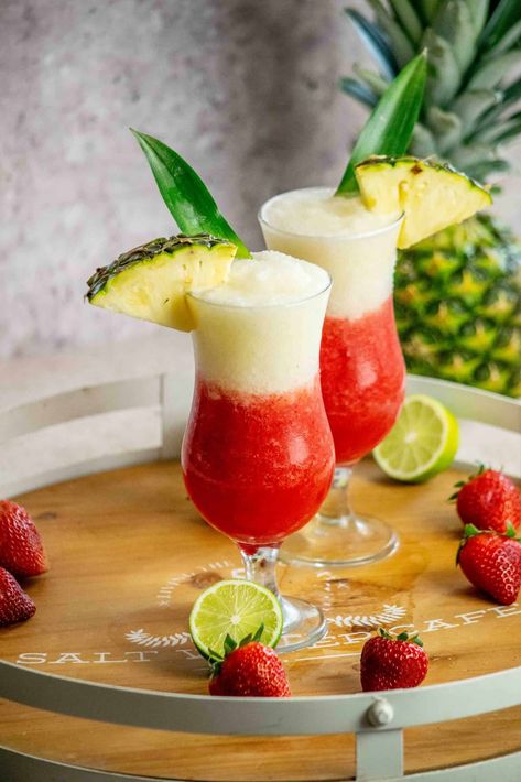 This easy Miami Vice recipe is an easy frozen drink, which combines 2 delicious cocktails (Strawberry Daiquiri and Pina Colada) into the perfect summer cocktail! Lava Flow Drink, Pinterest Drink, Tropical Drink Recipes, Breakfast Cocktails, Malibu Rum, Colorful Cocktails, Vegetarian Side Dishes, Light Rum, Frozen Cocktails