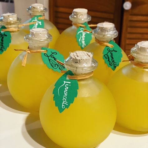 I decided I didn’t like the tall traditional limoncello bottles. So when I made my latest batch I broke with tradition and found some frosted cannon balls. I made my own tags with a leaf punch and tied my hand lettered leafs with rafia. Don’t they look like the cutest little lemons? #surlgurl Limoncello Bottle, Limoncello Bottles, Limoncello Labels, Plan 2023, Homemade Limoncello, Bottle Design Packaging, Fancy Drinks, Mini Bottles, Hand Lettered