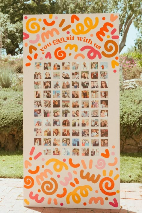 The couple went all out, gathering photos of every single guest and designing a unique welcome board seating chart. As guests arrived, they could find their 4x4 photo on the wall, pull it down, and discover their table number on the back. And in a playful nod to Mean Girls, the couple added the perfect touch: “You Can Sit With Us.” #retroweddingideas #weddingdecor #weddingcolors #weddingtheme #funwedding Interactive Wedding Ideas Unique, Wedding Decor Unique, Interactive Seating Chart Wedding, Conference Booth Ideas, High Wall Decor, Citrus Centerpieces, Creative Wedding Seating Chart, Whimsical Colorful Wedding, Photo Wall Party