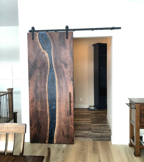 Black walnut slab with navy blue epoxy river Wood Epoxy Door, Walnut Barn Door, Wood And Epoxy Door, Epoxy Door Ideas, Epoxy Resin Door, Epoxy Barn Door, Epoxy Door, Resin Door, Epoxy Wood Table