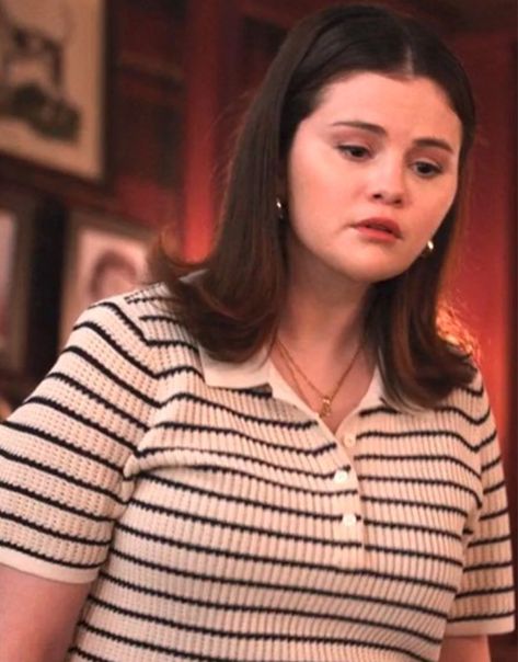 In Season 4 of “Only Murders in the Building,” Selena Gomez embodies her character, Mabel Mora, with wit and charm.This Only Murders In The Building S04 Selena Gomez Striped Polo Sweater is made from a comfortable Knit, offering a relaxed yet polished look that’s perfect for casual outings. Only Murders In The Building, Selena Gomez Outfits, Eva Longoria, Green Sequins, Polo Sweater, The Building, Pleated Mini Skirt, Long Sleeve Mini, Badgley Mischka