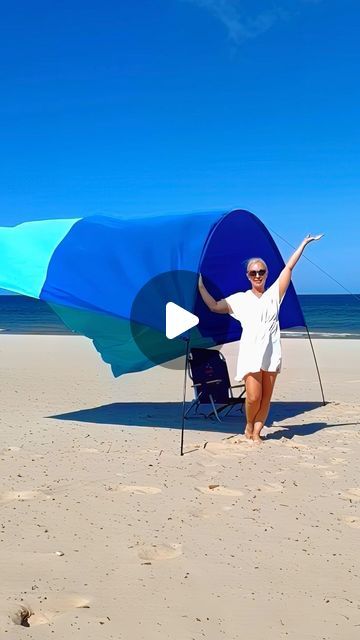 Valarie Linnen on Instagram: "#ad Comment SHADE for a shopping link.   Shimbui Sun Shades provide shade for the whole crew and allow you to enjoy the sun, sand, and sea knowing you are protected from the sun!   I was able to assemble mine in less than three minutes with NO HELP from anyone.  Here is how: -              Unpack the shade and pole from the convenient and lightweight backpack. -              Connect the poles together just like a camping tent. -              Thread the shade over the poles and secure…just like a camping tent. -              Plant both ends of the pole into the sand. -              Fill the backpack with sand to anchor the shade. -              Point the shade into the wind. -              Ahhhhhh…enjoy the beach knowing that you are protected from the sun to U Beach Shade Ideas, Beach Shade Tent, Beach Shade, Shopping Link, Sand And Sea, Lightweight Backpack, Camping Tent, Enjoying The Sun, Sun Shade