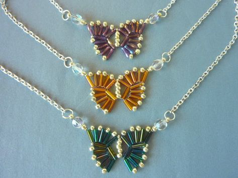 Clever Bugle Bead Butterfly Pendant Tutorial Weaving Patterns For Beginners, Bead Jewelry Ideas, Bead Butterfly, Free Beading Patterns, Beaded Necklace Patterns, Pendant Tutorial, Beadwork Necklace, Beading Patterns Free, Bead Embroidery Patterns