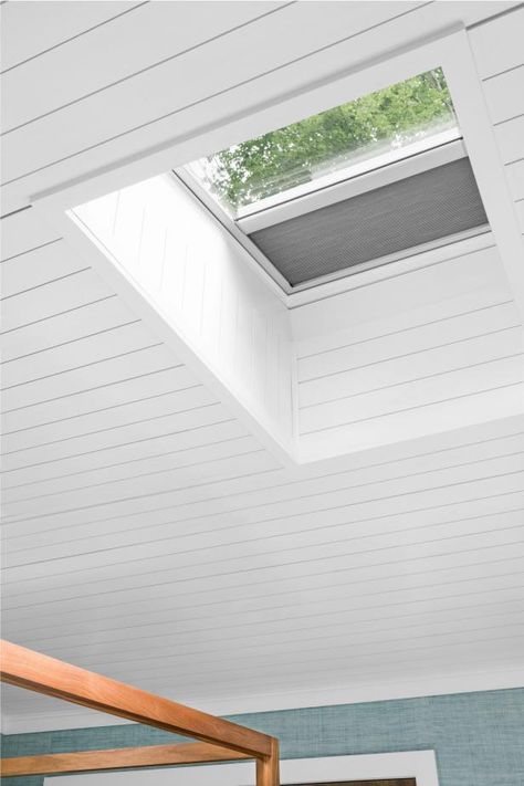 Sometimes the answer to making a small space feel larger is by looking up. Consider adding skylights to dark and dated rooms to instantly make them feel more open and airy. Recessing the skylight into a custom-built wall, as seen here, will also make the room feel taller. Skylight Trim Ideas, Adding Skylights, Skylight Design, Sky Lights, Porch Remodel, Outside Seating, Small Space Bedroom, Small Space Design, Design 101