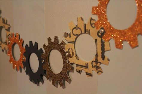 steampunk garland | interlocking gears paperchain Steampunk Paper Crafts, Steampunk Classroom, Steampunk Party Decorations, Gear Decorations, Steampunk Books, Robot Christmas, Christmas Steampunk, Cardboard Decorations, Maker Fun Factory Vbs 2017