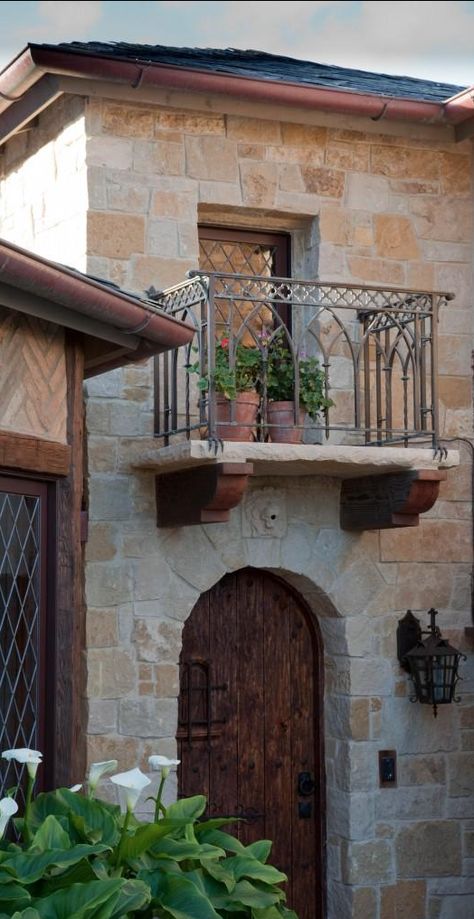 Tuscan style entry with faux balcony... Faux Balcony, Tuscan Style Garden, Style Toscan, Tuscan Architecture, Case In Pietra, Tuscan Style Homes, Balcony Window, Balcony Railing Design, Iron Balcony