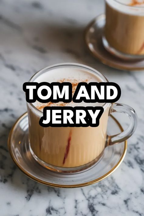 A photo of a  Tom and Jerry a winter cocktails Tom And Jerry Batter Recipe With Ice Cream, Tom & Jerry Drink Recipe, Tom And Jerry Recipe Hot Toddy, Tom And Jerry's Drink, Tom And Jerry Cocktail, Tom And Jerry Mix Recipes, Jack Daniels Winter Jack Recipes, Tippy Cow Recipes Drinks, Winter Jack Daniels