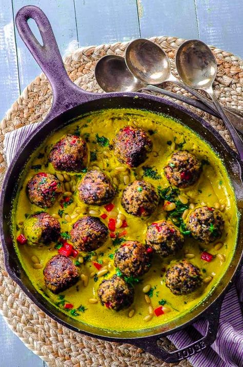 Quinoa Lentil Meatballs in Tahini-Turmeric Sauce - We created this recipes to celebrate our Cookbook launch. This easy recipe creates a magnificent dish in both taste and presentation.  Best yet, you can cook these meatless meatballs in either their vegetarian or vegan preparations without losing any of their incredibly rich flavor. #Vegan #cookbook #Middle Eastern #Tahini #Turmeric #tahiniandturmeric #recipe #meatballs #Quinoa #lentil Lentil Balls Vegetarian Meatballs, Fancy Vegan Dinner, Turmeric Sauce, Lentil Balls, Vegan Quinoa Recipes, Recipe Meatballs, Shavuot Recipes, Quinoa Lentil, Chag Sameach