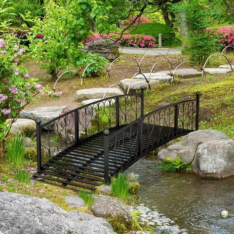 Outsunny 7' Metal Arch Garden Bridge with Safety Siderails, Decorative Arc Footbridge with Delicate Scrollwork "S" Motifs - Bed Bath & Beyond - 39961242 Metal Arch Garden, Garden Creek, Arched Garden Bridge, Garden Bridge Design, Backyard Bridges, Backyard Stream, Outdoor Bridges, Outdoor Statues Sculpture, Pond Bridge