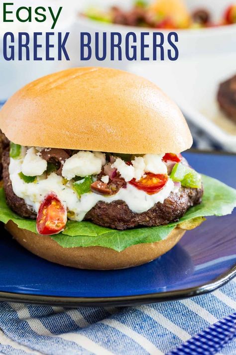 Easy Greek Burgers - perfectly grilled and topped with creamy tzatziki sauce and fresh Greek salad topping, these juicy and delicious burgers are simple to make and bursting with Mediterranean-inspired flavors! Makes a great gluten free dinner! Mediterranean Burgers, Greek Burgers, Greek Burger, Salad Topping, Smash Burgers, Easy Summer Dinners, Delicious Cupcakes, Greek Cooking, Summer Recipes Dinner