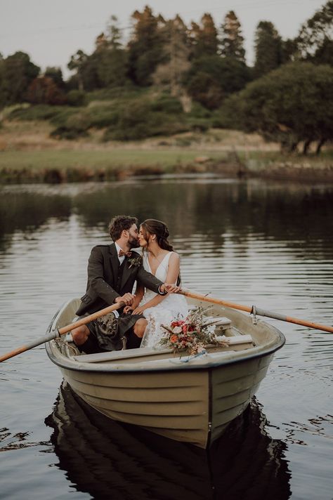 Bride and groom on a small row boat on the loch at Cardney Estate wedding venue Row Boat Wedding Photos, Wedding Photography Nature, Cottage Wedding Photos, Wedding Boat Pictures, Grainy Wedding Photography, Wedding Ride, Rustic Wedding Table Setting, Wedding Boat, Boat Photoshoot