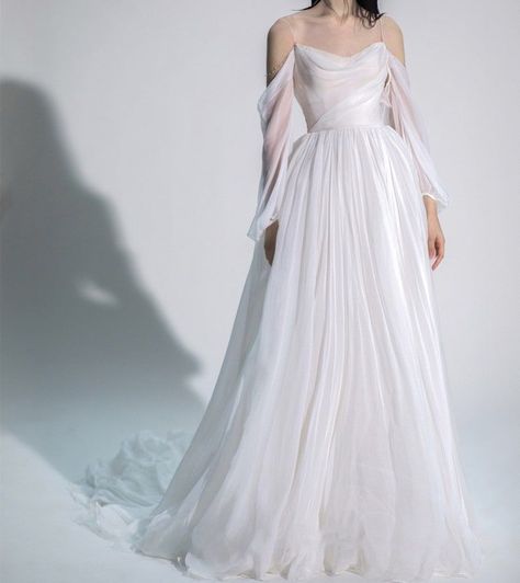 wedding dresses,wedding dresses with sleeves,wedding dresses simple,wedding dresses lace,wedding dresses black women,wedding dresses mermaid,wedding dresses 2022,wedding dresses 2023, Flowy Arm Wedding Dress, Chiffon Bridal Dress, Wedding Minimalist Dress, Chiffon Wedding Dress Flowy, Fantasy Inspired Wedding Dress, Modified A Line Wedding Dress, Minimalistic Wedding Dress, Weird Wedding Dress, Minimalistic Dress