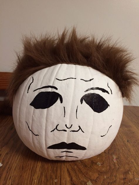 Michael Myers pumpkin Pumpkin Painting Michael Myers, Freddy Pumpkin Painting, Michael Myers Painted Pumpkin, Michael Myers Diy Decor, Micheal Myers Pumpkin, Unique Pumkins Ideas Painting, Scary Punkin Painting, Michael Myers Decor, Michael Myers Pumpkin Painting