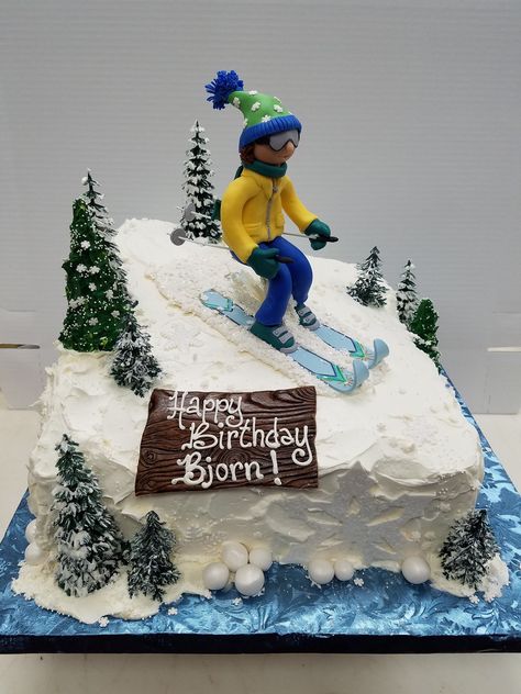 Shaped skiing birthday cake iced in buttercream with a fondant sculpted character and skis with artificial trees Snowboard Cake, Ski Cake, Winter Torte, Mountain Cake, 60th Birthday Cakes, Beer Theme, 50th Birthday Cake, Artificial Trees, Cake Images