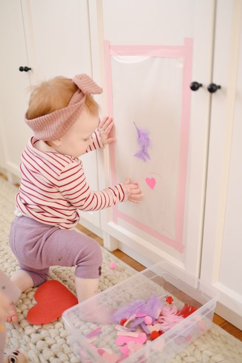 Valentine's Day Sensory Sticky Wall Activity For Babies - The Mama Notes Infant Valentines Day Activities, Valentines Day Activities For Infants, Valentines Day Activities For Babies, Valentines Activities For Infants, Valentines Infant Activities, Valentines Sensory Activities For Babies, Baby Valentines Activities, February Infant Activities, Valentine Games For Toddlers