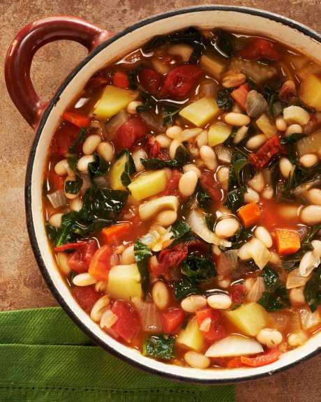 Portuguese White Bean and Kale Soup from Moosewood Restaurant Favorites: The 250 Most-Requested, Naturally Delicious Recipes from One of America s Best-Loved Restaurants by The Moosewood Collective (St. Martin s Griffin). Photo: St. Martin's Griffin / © Jim Scherer, 2012 / jim@jimscherer.com Kale White Bean Soup, Kale White Bean, Dried Peas, Peas Recipes, White Bean Kale Soup, Fennel Bulb, Beans Potatoes, Kale Soup Recipes, Dried Thyme