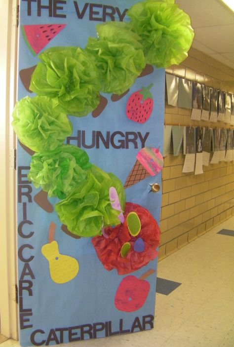 Read Across America "The Very Hungry Caterpillar" Door The Very Hungry Caterpillar Classroom Door, Read Across America Door Decorations, Caterpillar Bulletin Board, Eric Carle Classroom Theme, Hungry Caterpillar Classroom, Eric Carle Classroom, Spring Classroom Door, A Very Hungry Caterpillar, Hungry Caterpillar Activities