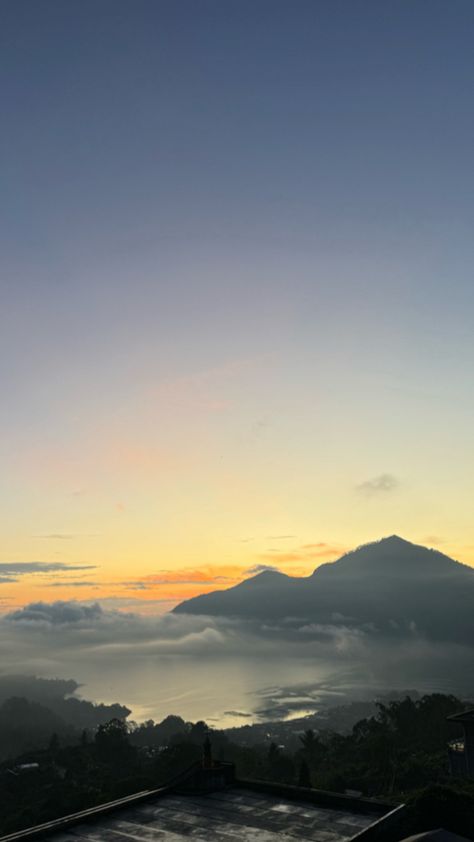 The view of the sunrise behind the mountain with beautiful clouds Beautiful Clouds, The Sunrise, The View, The Mountain, Bali, Quick Saves