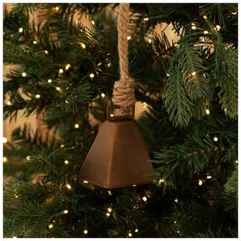 Dimension: 5" H x 3.25" W x 2.44" D Material: Metal & Jute Color: Bronze & Natural Quantity: 1 Ring in the most wonderful time of the year with this Bronze Cowbell Ornament. This metal ornament is shaped like a bronze cowbell with a slightly distressed finish. There is a round ball inside the bell to make it ring a charming chime. Use the jute rope to display this ornament on your Christmas tree for a rustic look! Hobby Lobby Christmas, Bell Ornaments, Diy Projects Videos, Rustic Christmas Tree, Cow Bell, Floral Shop, Jute Rope, Wonderful Time Of The Year, Metal Ornament