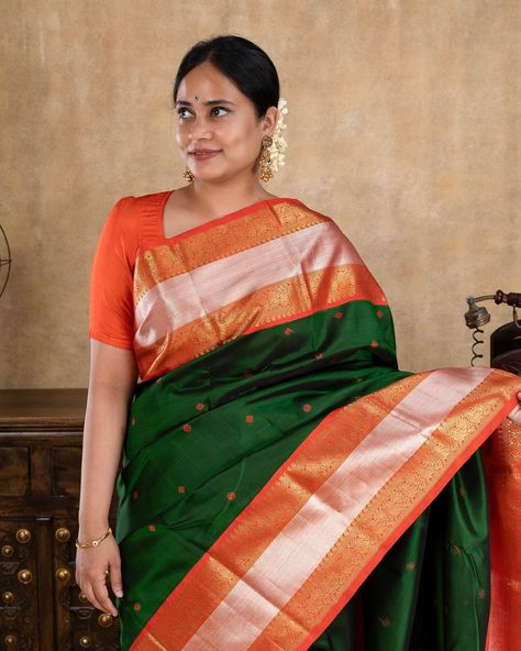 Elevate your style with our Cadmium Green and Orange Pure Kanchipuram Silk Saree. Made of high-quality silk, this saree exudes elegance and sophistication. The stunning color combination of green and orange adds a pop of color to your wardrobe. Perfect for any occasion, this saree is sure to turn heads and make you feel confident and beautiful. Saree code : CL60262 Cadmium Green, Latest Sarees, Kanchipuram Silk Saree, Saree Look, Beautiful Saree, Elevate Your Style, Color Combination, Feel Confident, Green And Orange