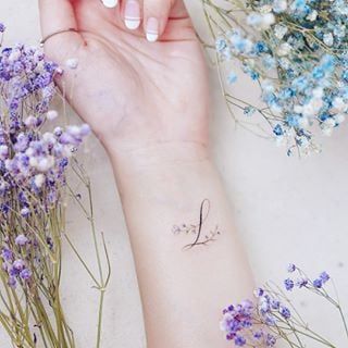 65 Amazing L Letter Tattoo Designs and Ideas 39 L Letter Tattoo, Letter L Tattoo, Hello Tattoo, Small Letter Tattoo, L Letter, Tiny Wrist Tattoos, Alphabet Tattoo Designs, Letter Tattoo, Cool Wrist Tattoos