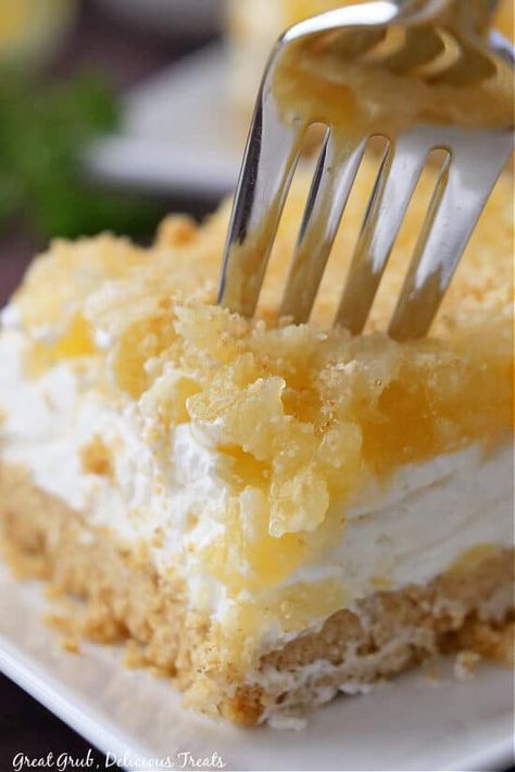 Pineapple Cream Cheese Dessert is a delicious, easy and refreshing summer dessert recipe with a sweet cream cheese filling and topped with pineapple pie filling and crushed pineapples. Pineapple Lasagna, Deserts With Crushed Pineapple, Pineapple Cream Dessert, Desserts With Crushed Pineapple, Pineapple Pie Filling, Pineapple Pie Filling Recipes, Pineapple And Cream Cheese, Pineapple Cream Cheese Cake, Cream Cheese Pineapple Cake