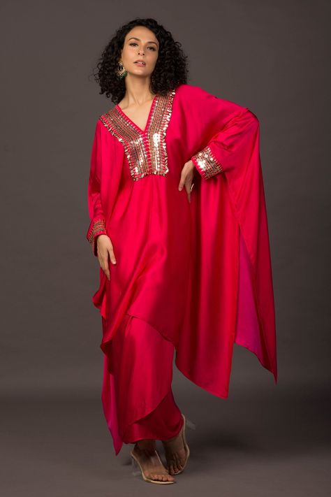 Glow pink kaftan kurta with sequin embroidery on the neckline and asymmetrical hem. Comes with a co-ordinating wrap skirt. Components:2 Pattern:Embroidery Type of Work:Sequin and Thread Neckline:V neck Sleeve Length:Kaftan Sleeves Fabric:Satin Color:Pink Other Details: Asymmetrical hem Sequin embroidered cuffs Occasion:Destination Wedding - Aza Fashions Kaftan Dress Pattern, Isha Gupta, V Neck Kaftan, Waistcoat Pattern, Kaftan Kurta, Satin Embroidery, Organza Embroidery, Kurta Patterns, Red Cape