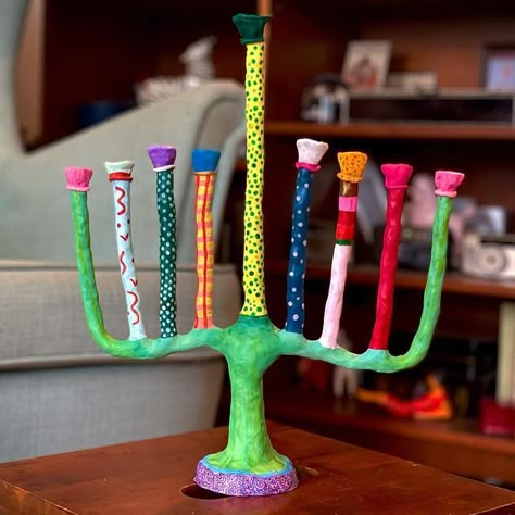 Lulu Krause on Instagram: "Hand-sculpted menorah, made of wire, a RAO’s tomato sauce lid, and polymer clay. I started making this after seeing Labyrinth for the first time, and wanted to create a menorah for the Goblin King himself! I’m excited to use this this coming Thursday, and for many Hanukkahs to come. Swipe for process pics (that include two glimpses of the shows I watched while working on this for the past seven days)." Hannukah Crafts, Animation Painting, Hanukkah Diy, The Goblin King, Diy Pottery Painting, The Goblin, Hanukkah Decorations, Goblin King, Diy Pottery