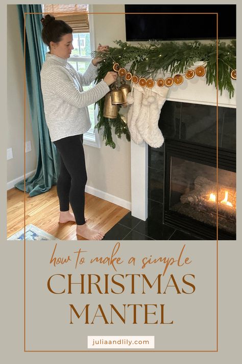 Fixing the fireplace mantel with decor. Green garland, bells, and orange garland. Simple Christmas Mantel, Target Lighting, Christmas Mantel Decor, Christmas Garlands, Christmas Fireplace Decor, Pine Garland, Christmas Mantel, Christmas Mantel Decorations, Mantel Decor