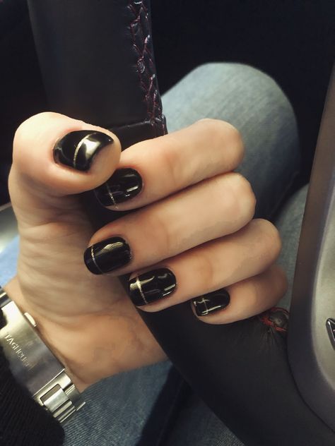 Black Nails With Gold Stripe, Black And Gold Minimalist Nails, Short Black Nails With Gold Design, Black Nails With Gold Accent, Black Nails Gold Accent, Black And Metallic Nails, Black And Gold Short Nails, Black And Gold Nails Short, Foil Nail Designs