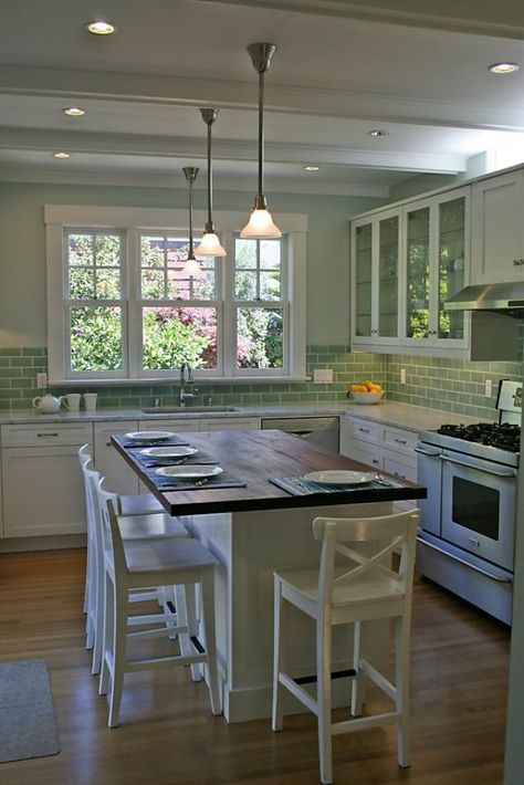 A rustic wood-covered island doubles as a place to dine in this Craftsman-style kitchen featured on the Rockridge Kitchen Tour on Oct. 2. Photo: Natalie Mehta Modern Farmhouse Kitchen Backsplash, Dapur Rustic, Small Farmhouse Kitchen, Farmhouse Kitchen Backsplash, Small Kitchen Island, Farmhouse Kitchen Island, Herringbone Backsplash, Kabinet Dapur, Kitchen Island With Seating