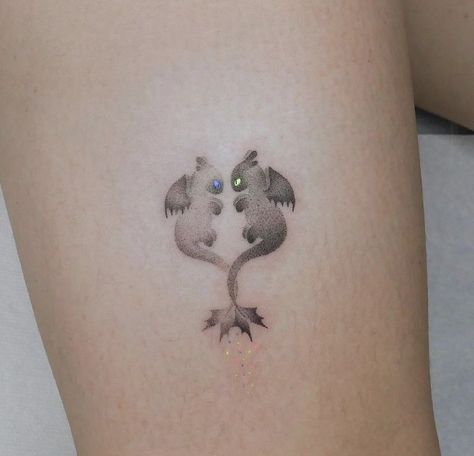 Small Cute Dragon Tattoo, How To Train Your Dragon Tattoo Couple, Tiny Dragon Tattoo For Women, Tiny Dragon Tattoos, Mini Wolf Tattoo, Toothless And Light Fury Tattoo, Light Fury Tattoo, Small Dragon Tattoo For Women, Dragon Wrist Tattoo