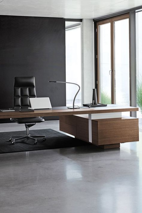 The spacious desk’s architecture made for management offices wins with clarity. With its powerful aesthetics, the streamlined proportions generate an impressive aura. For vision and trust on C level. #furniture #interior #luxuryinteriors #luxuryfurniture #design #moderndesign #modernism #madeingermany #executive #desk #office Ceo Office Design Luxury Modern, Ceo Office Design Luxury, Executive Office Design Interior, Ceo Office Design, Executive Office Design, Desk Modern Design, Ceo Office, Office Desk Designs, Modern Home Office Desk