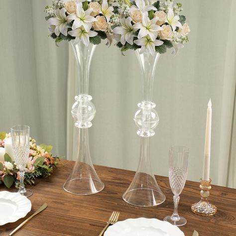 PRICES MAY VARY. Quantity: 2 Trumpet Vases Material: Plastic Color: Clear Style: Reversible Trumpet Vase w/ Crystal Accent Total Height: 21" Top/Base Opening Diameter: 5.5" Top/Base Depth: 8.75" Middle Ball Diameter: 3.25" Assembly Required: Yes. Easy to Assemble. HIGH QUALITY: These vases are made from high-quality premium material. To make things swankier, we have designed it on the master of luster. This elegantly shimmering piece comprises shiny material crafted with the utmost perfection. C 50 Wedding Anniversary Centerpieces, Napkins Ideas, Glass Vases Centerpieces, White Wedding Decorations, Trumpet Flower, Acrylic Vase, Small Centerpieces, Metallic Gold Color, Clear Vase