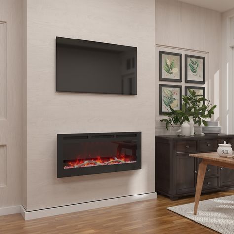 This electric fireplace is designed for recessed in-wall/wall-mounted installation. Enjoy the warmth and ambiance of a traditional fireplace with this sleek rectangular design and the modern black scheme of an electric fireplace. Electronic Fireplace, Wood Mantle Fireplace, Wall Mounted Electric Fires, Electric Fireplace Wall, Recessed Electric Fireplace, Wall Mounted Fireplace, Wood Mantle, Fireplace Tv Wall, Wall Mount Electric Fireplace