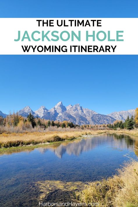 A river with orange foliage on the shore and mountains in the background. A text overlay at the top says: the ultimate Jackson Hole Wyoming itinerary. Jackson Hole Wyoming Honeymoon, Jackson Hole Yellowstone Itinerary, What To Do In Jackson Hole Wy, Jackson Hole In October, Where To Stay In Jackson Hole Wyoming, Jackson Hole Itinerary, Things To Do In Jackson Hole Wyoming, Jackson Hole Wyoming Fall, Jackson Wyoming Summer