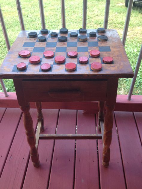 Outdoor checker table made from an old distressed end table.  Checker pieces made from a limb!! Checker Table, Outdoor Checkers, Checkers Table, Checkerboard Table, Wooden Cooler, Family Board Game, Board Game Table, Game Tables, Primitive Homes