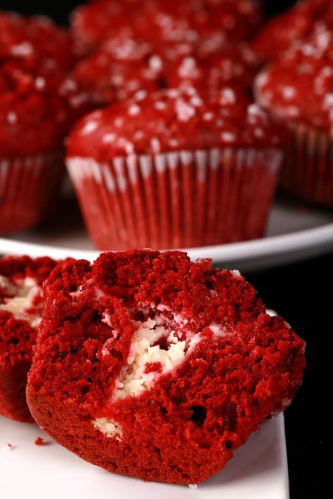 A cut open red velvet muffin with cream cheese filling, with more red velvet muffins behind it. Red Velvet Cream Cheese Muffins, Red Velvet Muffins With Cream Cheese, Red Velvet Muffins Recipe, Muffin With Cream Cheese Filling, Red Muffins, Red Velvet Muffin, Cream Cheese Filled Cupcakes, Red Velvet Muffins, Red Velvet Oreo