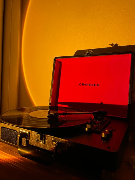 Crosley record player with sunset lamp Old Record Player Aesthetic, Vintage Record Player Aesthetic, Vinyl Player Aesthetic, Vinyl Record Player Aesthetic, Vinyl Aesthetic Vintage, Vinyl Disk Aesthetic, Red Record Player, Lp Aesthetic, Record Player Wall