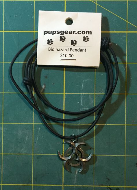 biohazard necklace on adjustable leather cord Biohazard Necklace, Leather Cord, Summer 2024, Necklaces, Electronic Products, Pendant, 10 Things, Leather