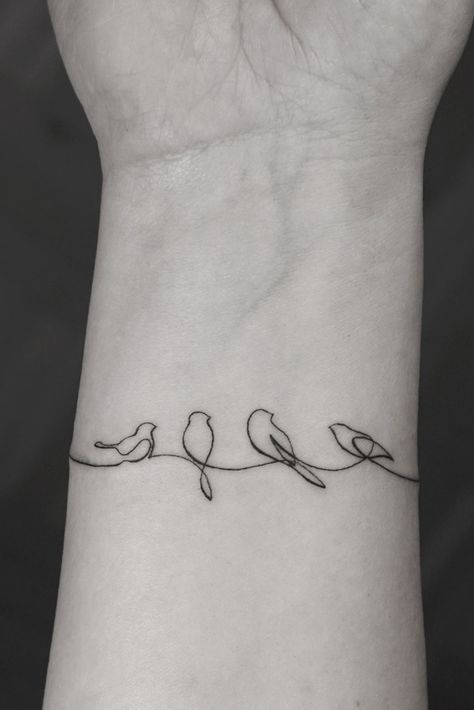 Tattoo Artist Selection Guide: How To Find The Right One For You Fine Line Bird On Branch Tattoo, Family Line Tattoo Ideas, Bird Mom Tattoo, Bird Flight Tattoo, Bird Bracelet Tattoo, Sun And Birds Tattoo, Family Of Three Tattoo, Simplistic Bird Tattoo, Family Birds Tattoo